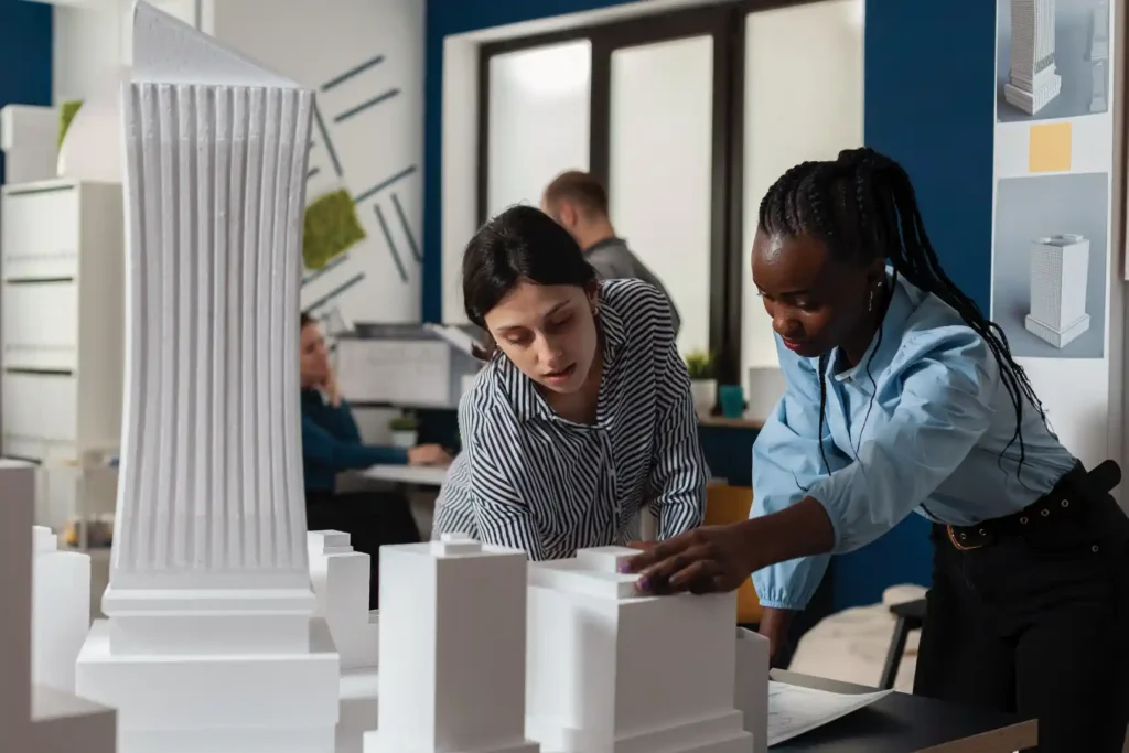 Designers looking over archietct mockups.